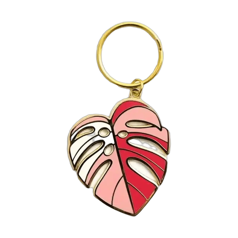Pink and red enamel leaf keychain with a gold-colored split ring